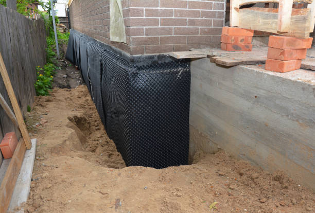 Happy homeowners after waterproofing job in Richlandtown